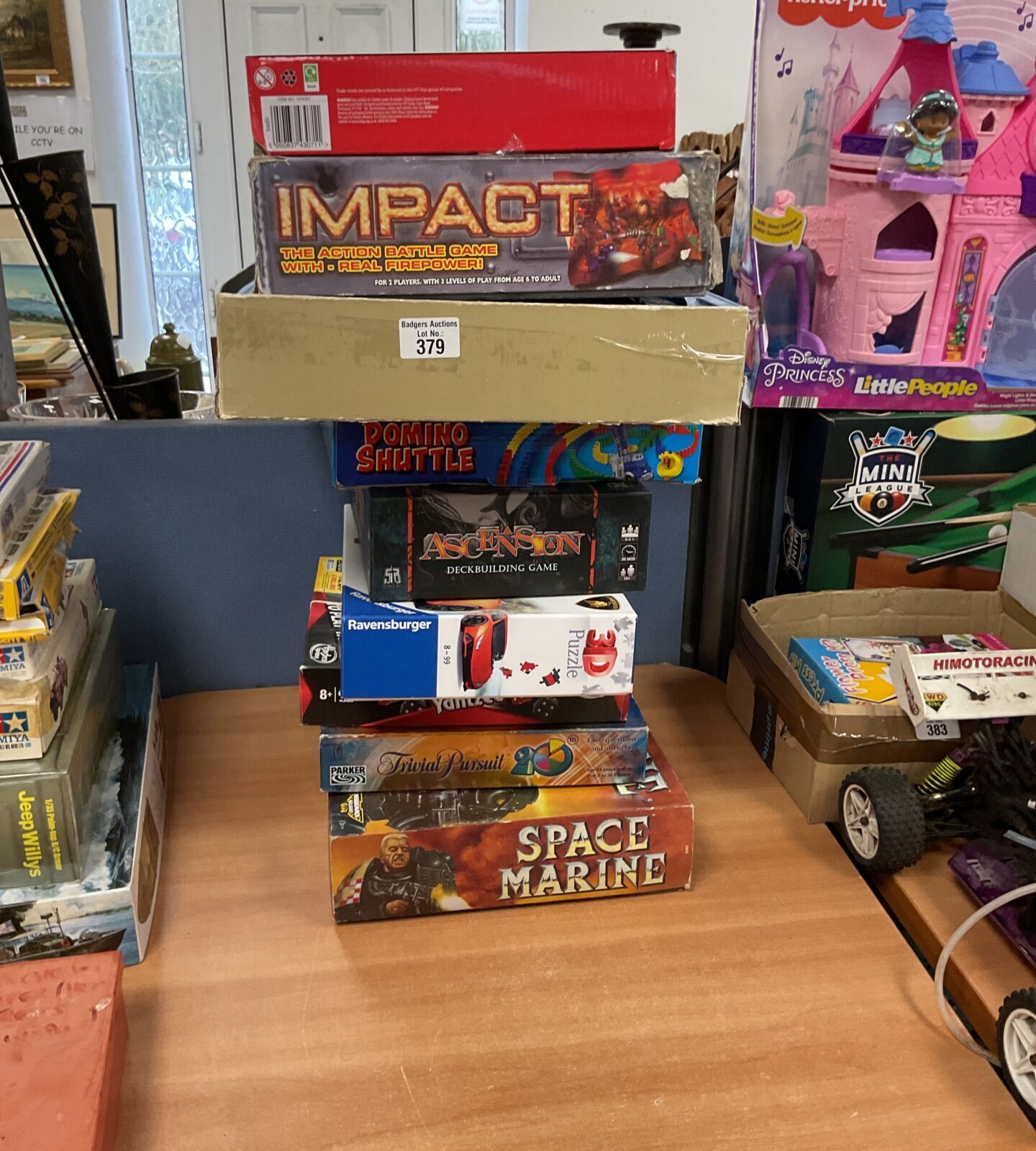 Mixed lot of board games and puzzles including Space Marine and Ravensburger.