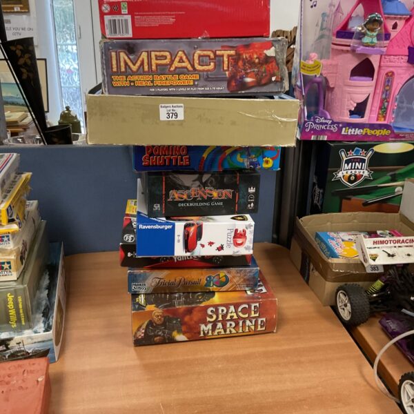 Mixed lot of board games and puzzles including Space Marine and Ravensburger.