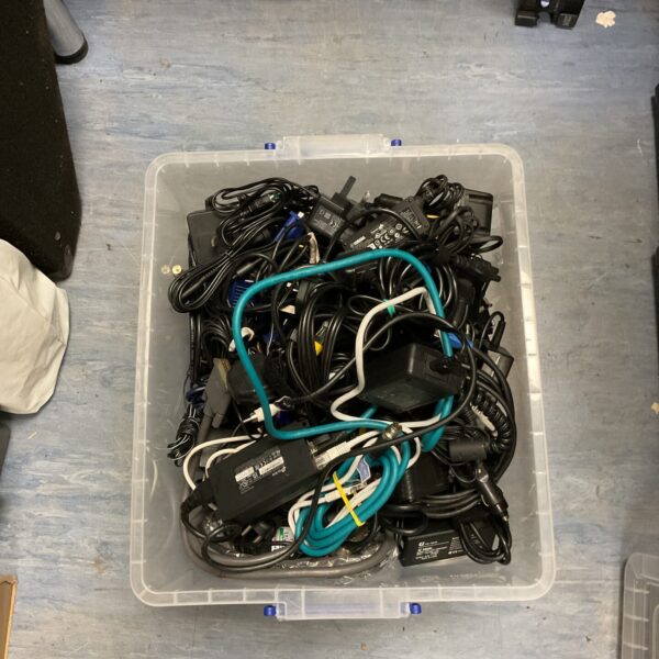 Mixed lot of cables and adapters for various electronics.