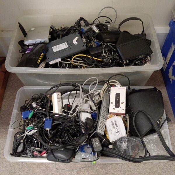Mixed lot of cables and power supplies for various electronics.