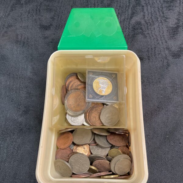 Vintage Oxo tin filled with a mixed lot of old coins.