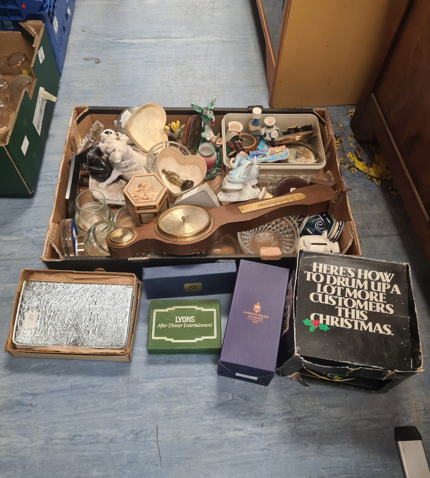 Mixed lot of vintage curios and glassware with a barometer.