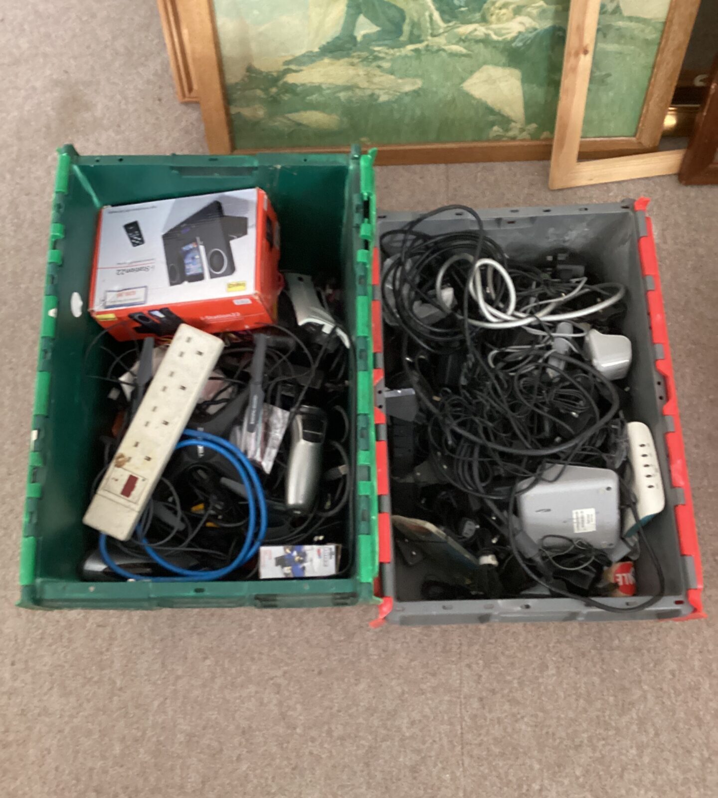 Mixed electronics lot with two crates of cables and components.