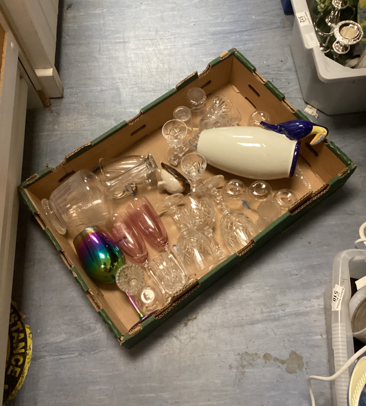 Mixed glassware lot with Stewart crystal and a toucan vase.
