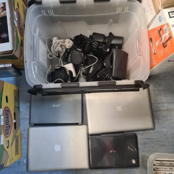 Mixed lot of laptops and Canon cameras for repair or parts.