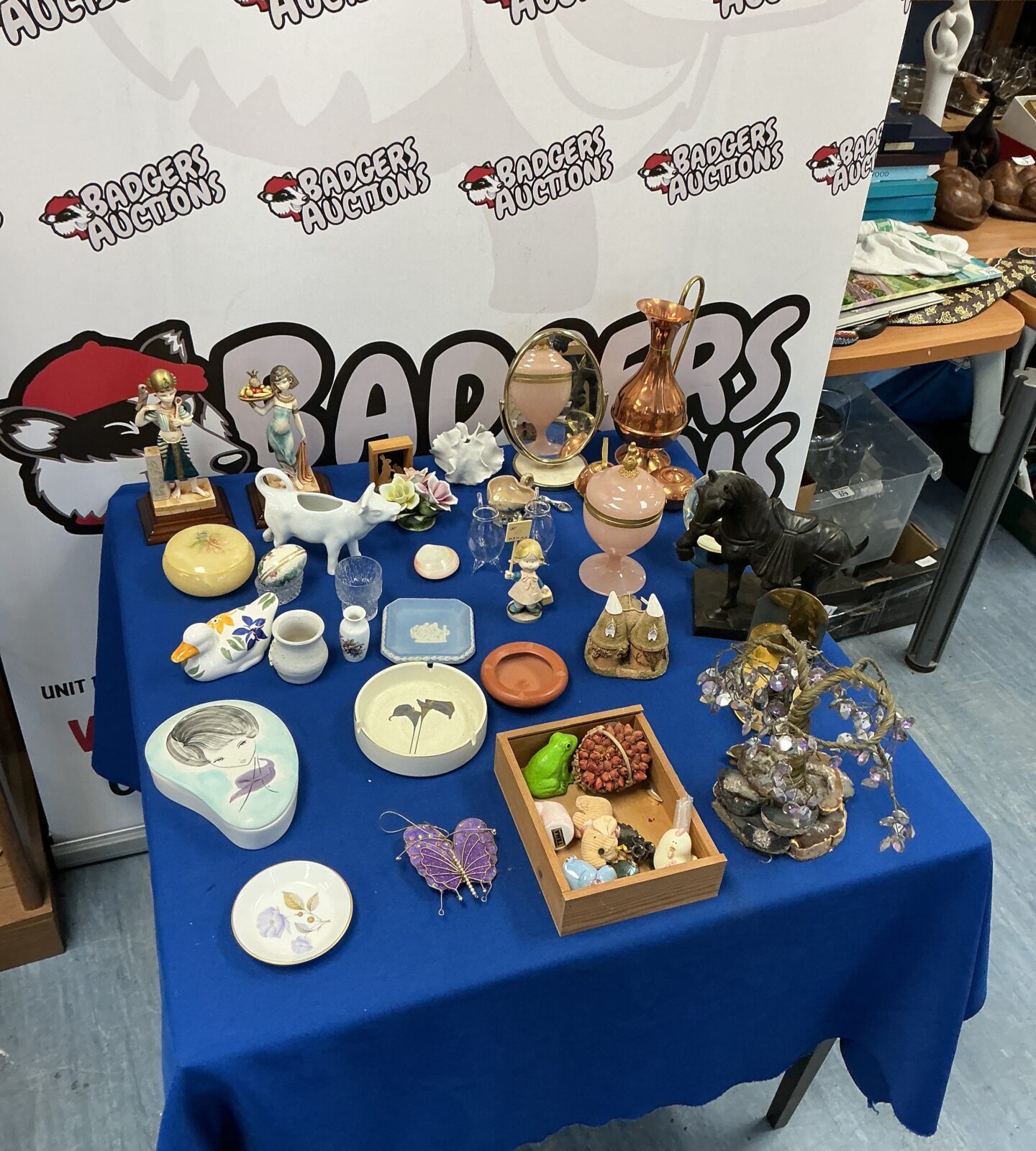 Mixed lot of vintage collectibles including a copper jug and porcelain figures.