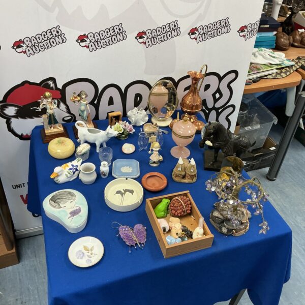 Mixed lot of vintage collectibles including a copper jug and porcelain figures.