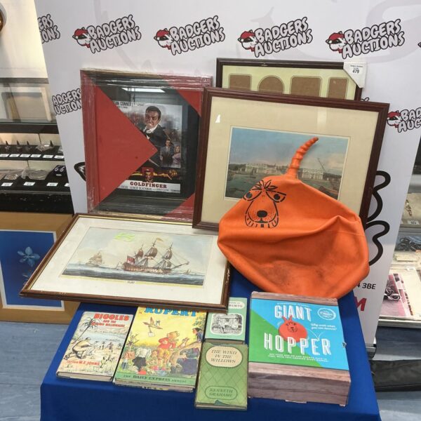 Mixed lot of vintage books and a colourful Giant Space Hopper.