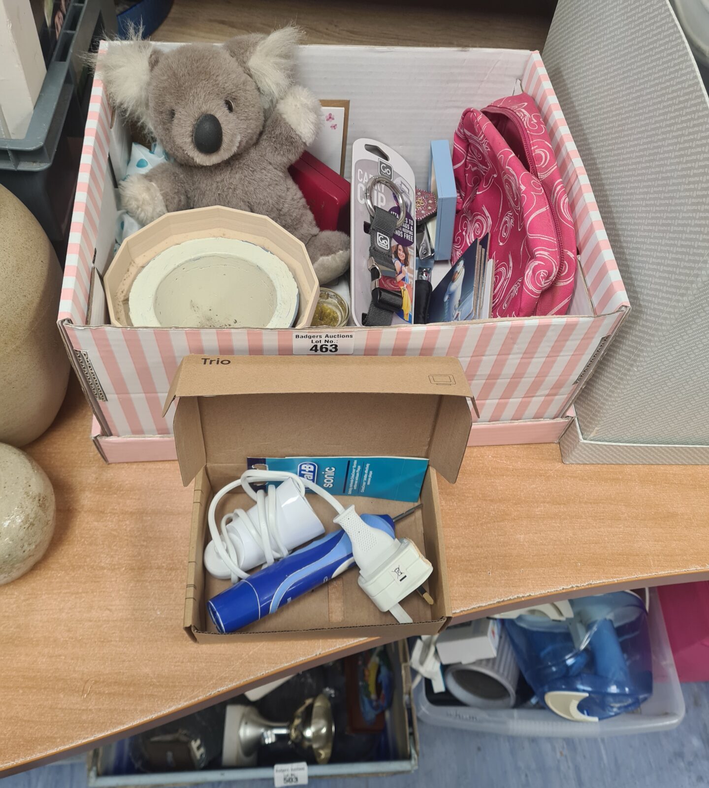 Mixed lot of toys and collectibles including a koala and toothbrush.