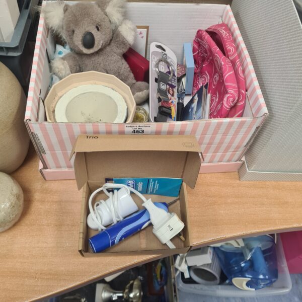 Mixed lot of toys and collectibles including a koala and toothbrush.