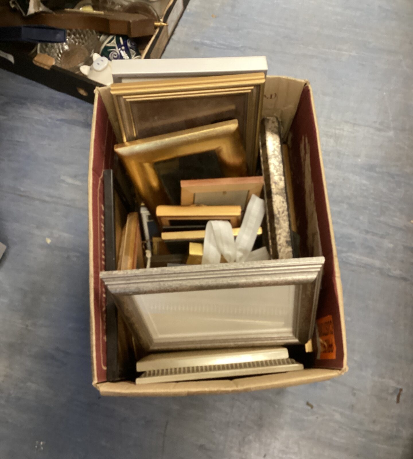 Mixed lot of vintage and assorted picture frames for wall decor.