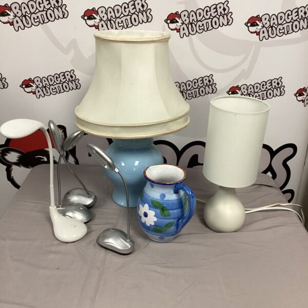 Mixed collection of vintage and modern table lamps for sale.
