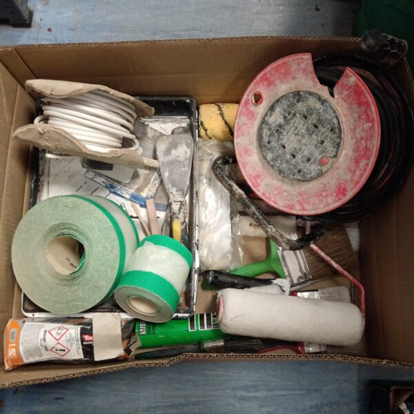 Mixed lot of DIY tools and electrical cable for home projects.