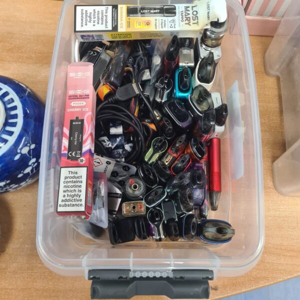 Mixed vape lot collection of disposable e-cigarettes and vape pens.