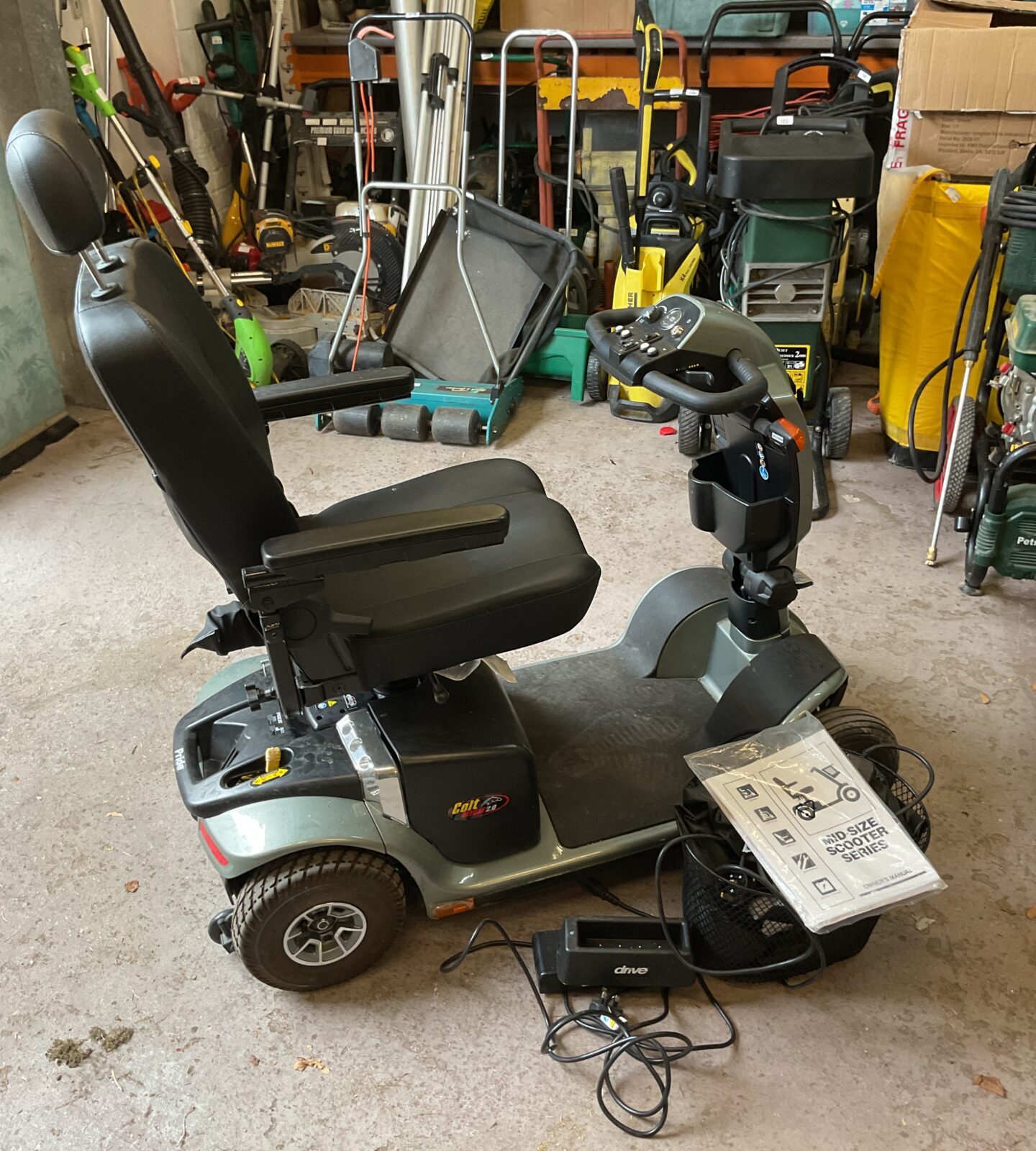 Side view of the silver Pride Colt Deluxe 2.0 mobility scooter.