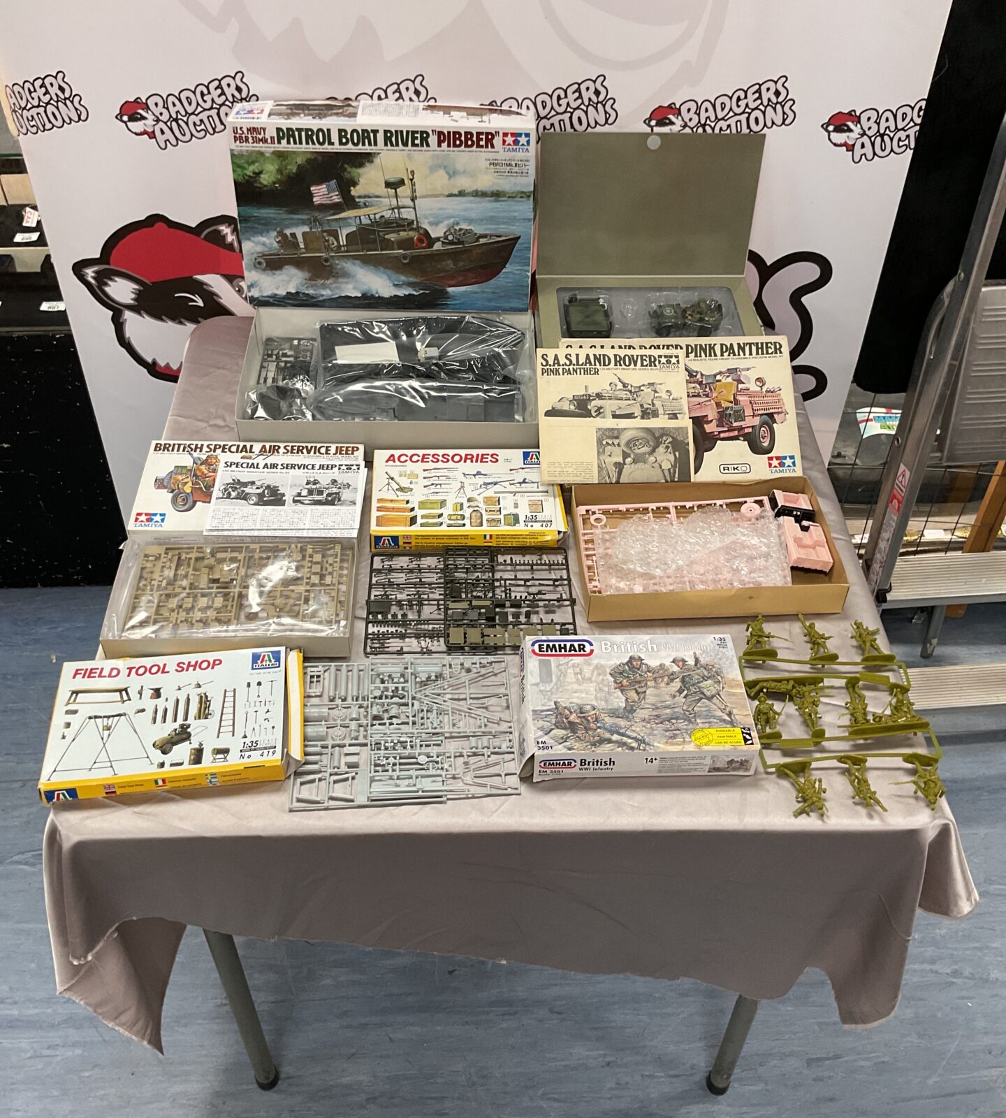 Assorted model kits including Tamiya and a Jeep Willys RC model.