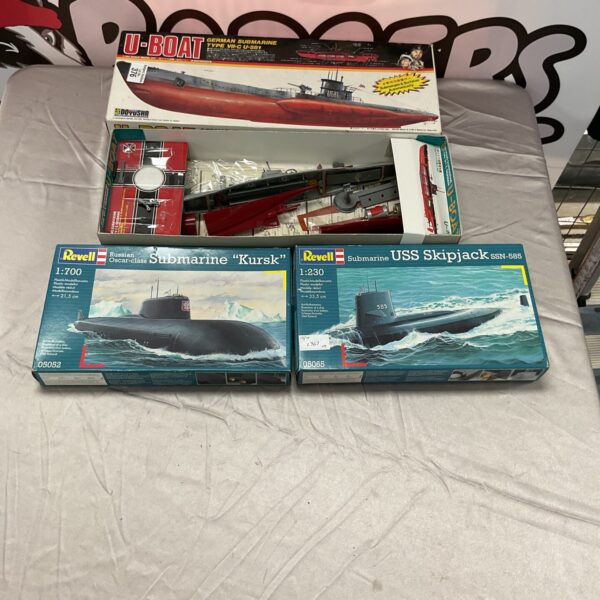 Vintage boxed model kits including Revell and a U-Boat submarine.