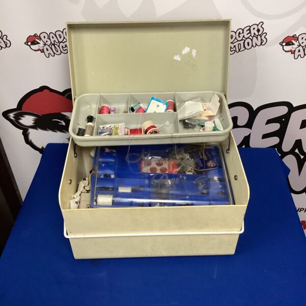 Vintage Mothercare sewing box with contents, a classic sewing kit.
