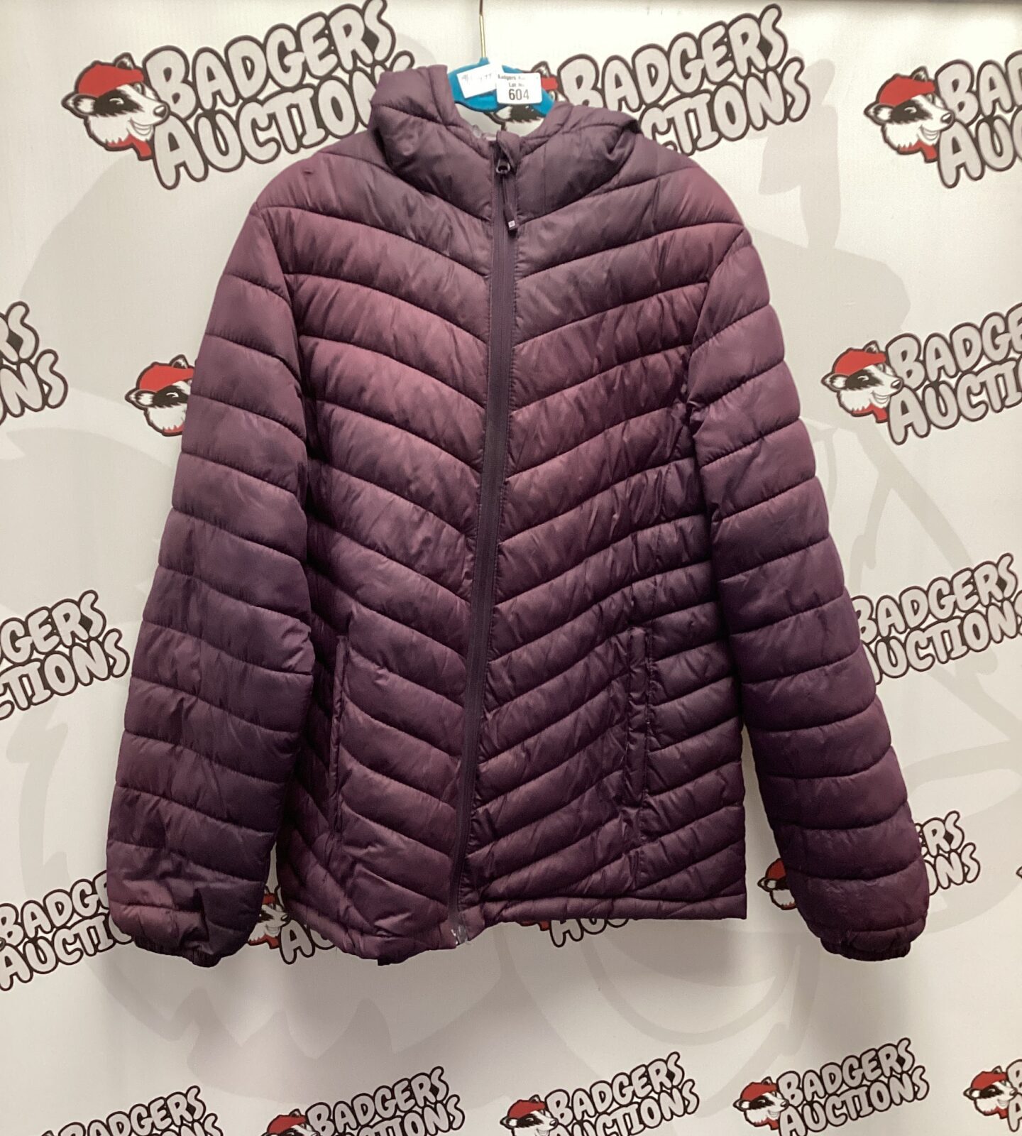 Women's size 16 Mountain Warehouse puffer jacket for winter warmth.