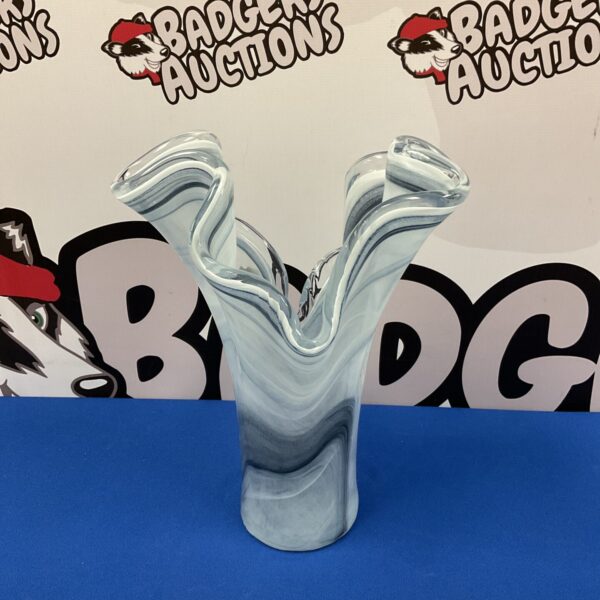 Vibrant Murano glass vase with an open petal design.