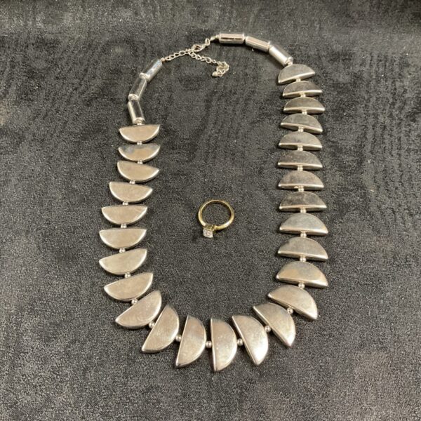 Vintage Nall necklace and ring set with white stone detail.