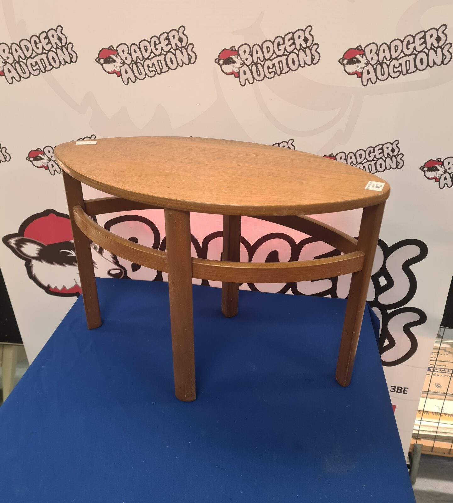 Vintage Nathan Trinity table with teak top and tripod legs.
