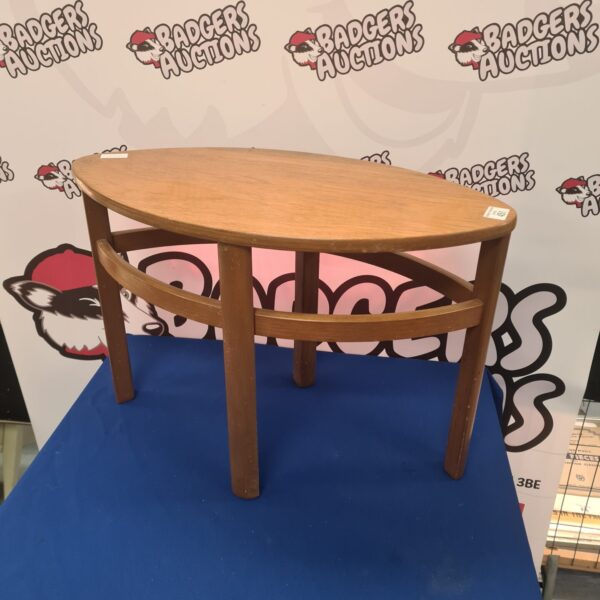 Vintage Nathan Trinity table with teak top and tripod legs.