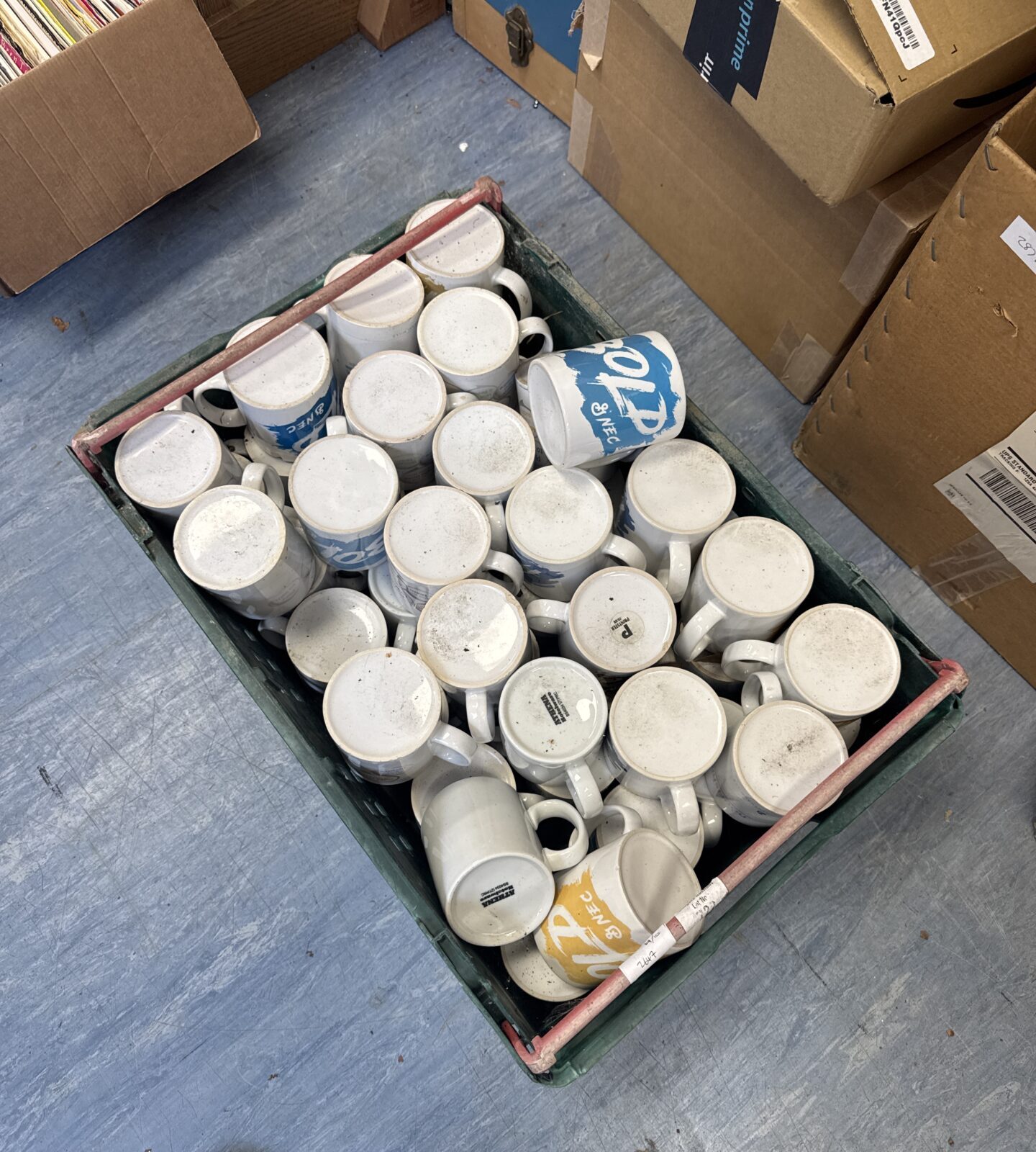 Large lot of white NEC branded coffee mugs for office or collection.