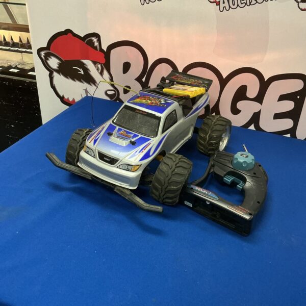 Vintage Nikko Rocket Racer RC car in need of repair.
