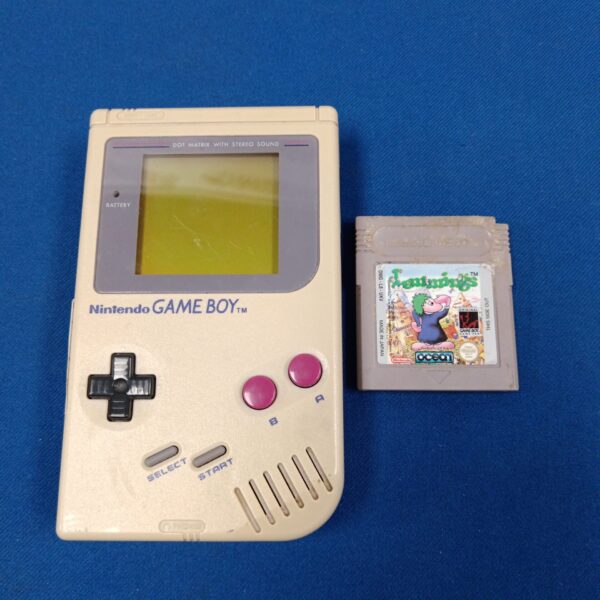 Vintage Nintendo Game Boy console with Lemmings game cartridge.