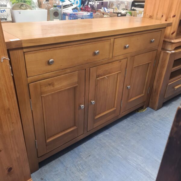 Vintage solid oak sideboard with two drawers for kitchen storage.