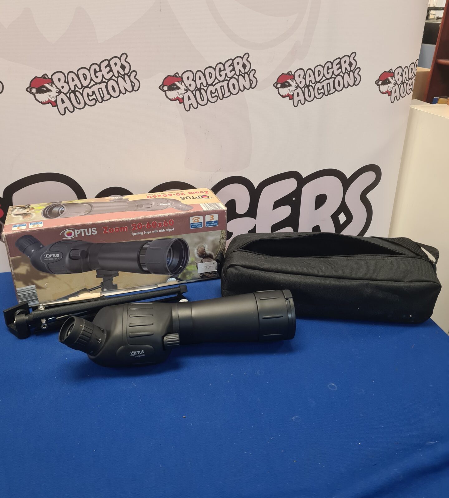Boxed Optus Zoom 20-60x60 spotting scope with tripod and case.