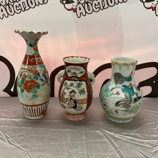 Three oriental vases with a swallow bird pattern.