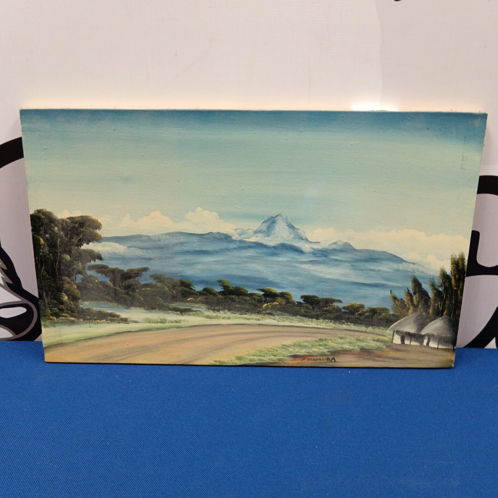 Vibrant African mountain oil painting by P Mwaura, a beautiful landscape.