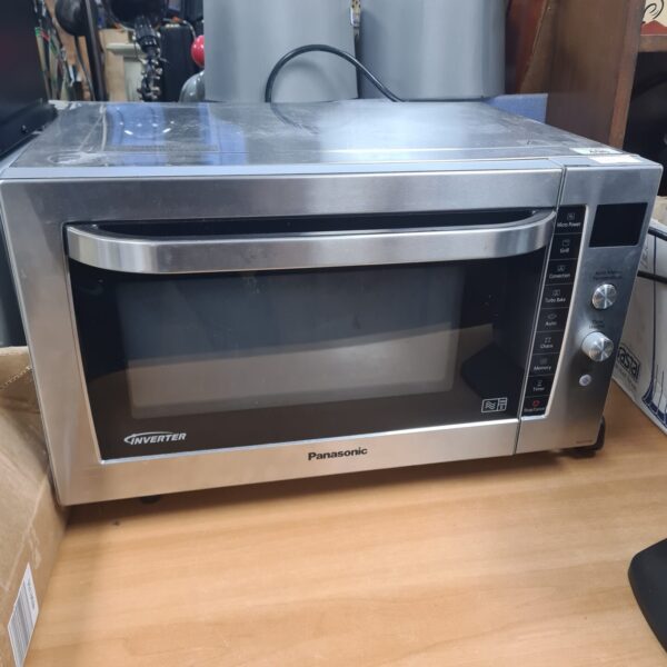 Stainless steel Panasonic inverter microwave oven for kitchen use.