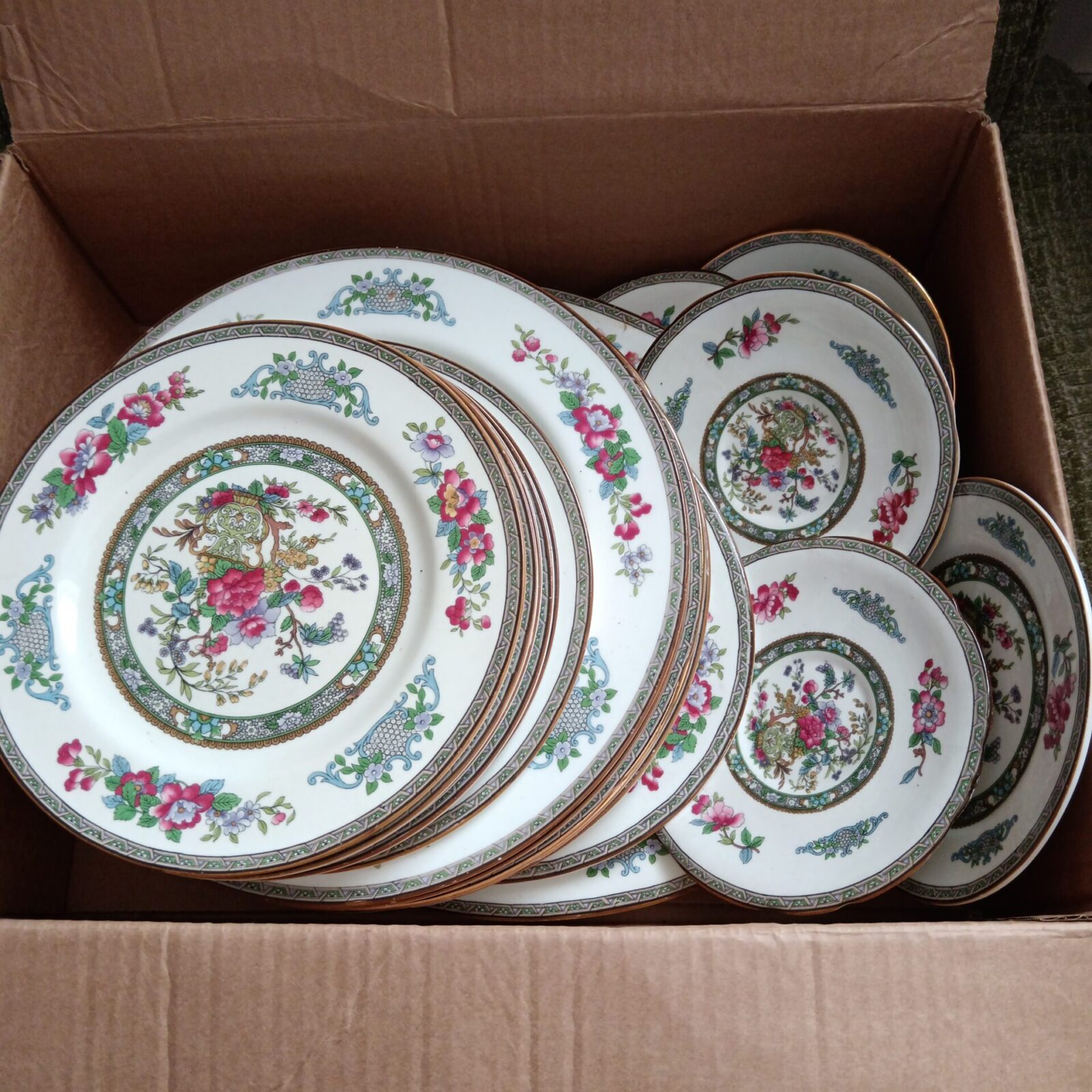 Vintage Paragon Tree of Cashmere plates with floral design.