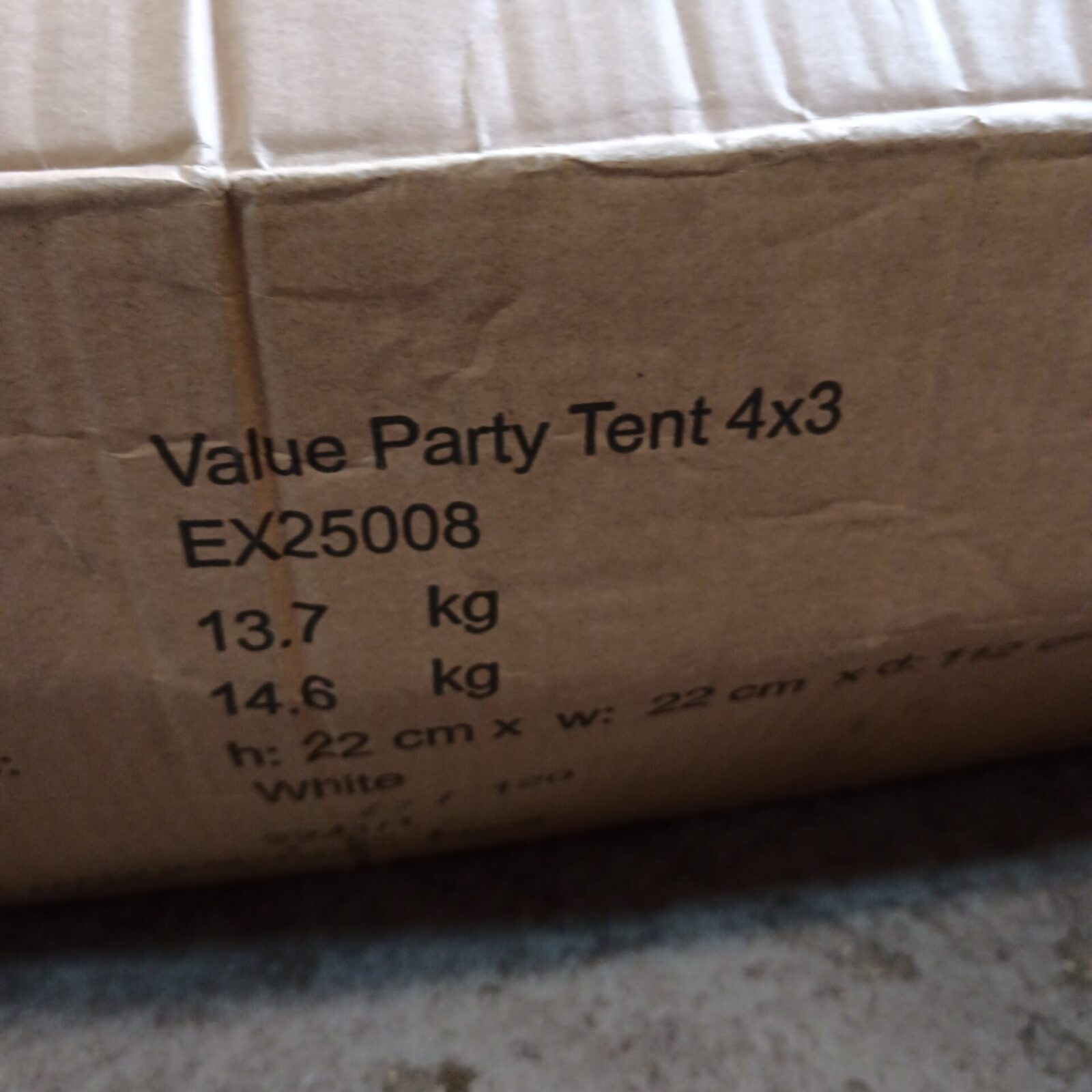 Overhead view of a 3x4 party tent in used condition.