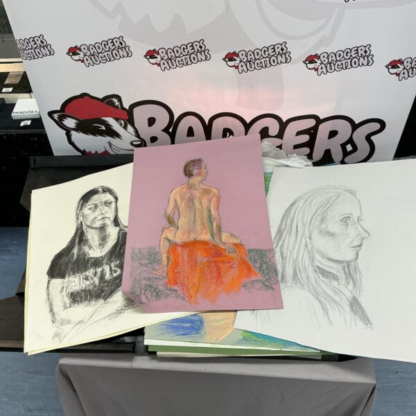 Pastel portrait drawings from a studio portfolio, showcasing figure studies.
