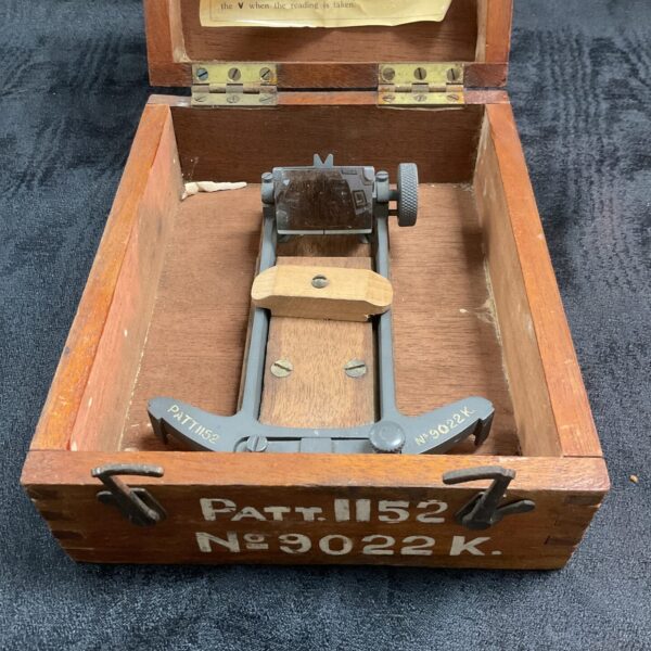 Open view of the British Military Patt 1152 Azimuth Circle in its wooden box.