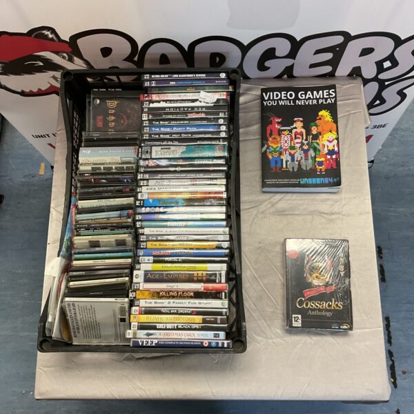 Lot of vintage PC games and a book about unplayed games.