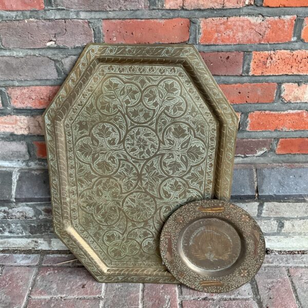 Antique Persian brass charger plate and copper peacock plate set.