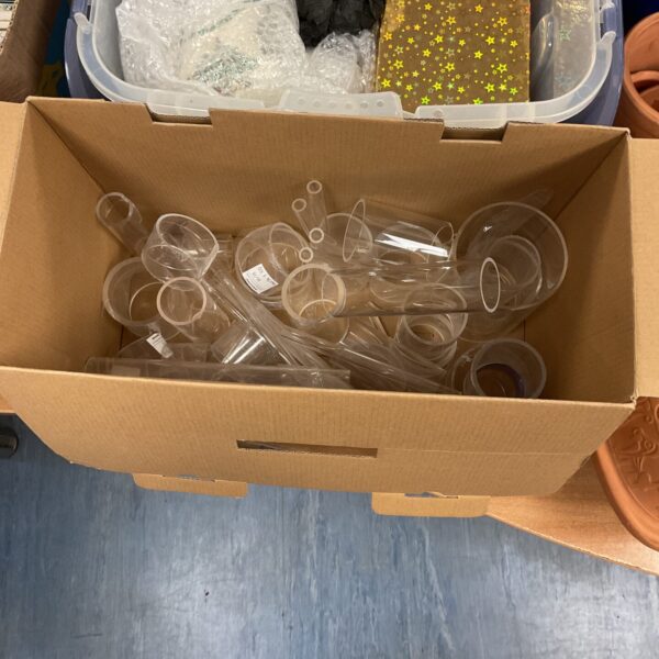 Mixed lot of clear perspex tubing for crafting and DIY projects.