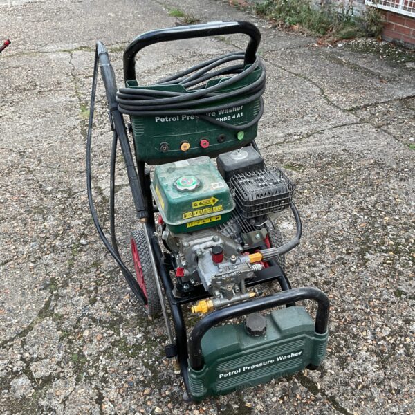 Working petrol pressure washer, model PHDB 4 A1, for garden cleaning.
