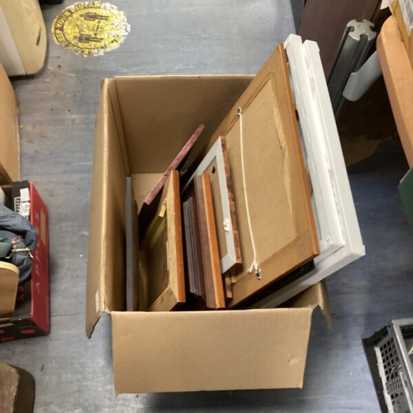 Assorted vintage and contemporary picture frames and art lot.