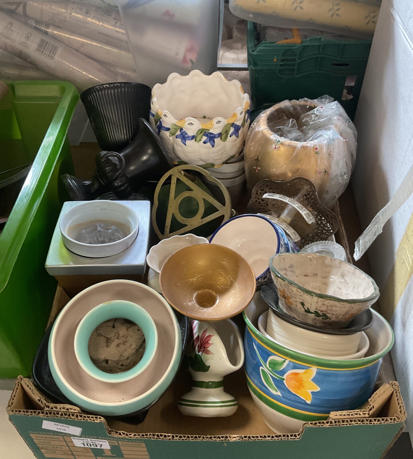 Vintage plant pots and brass trivet in a colourful lot.