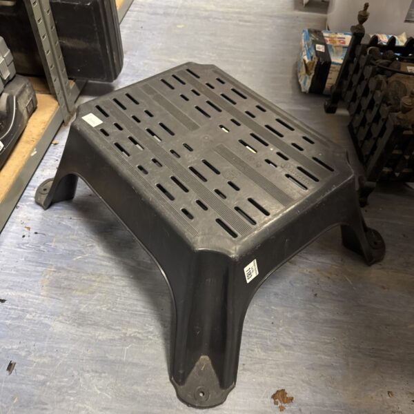 Durable plastic access step for workshop or industrial use.