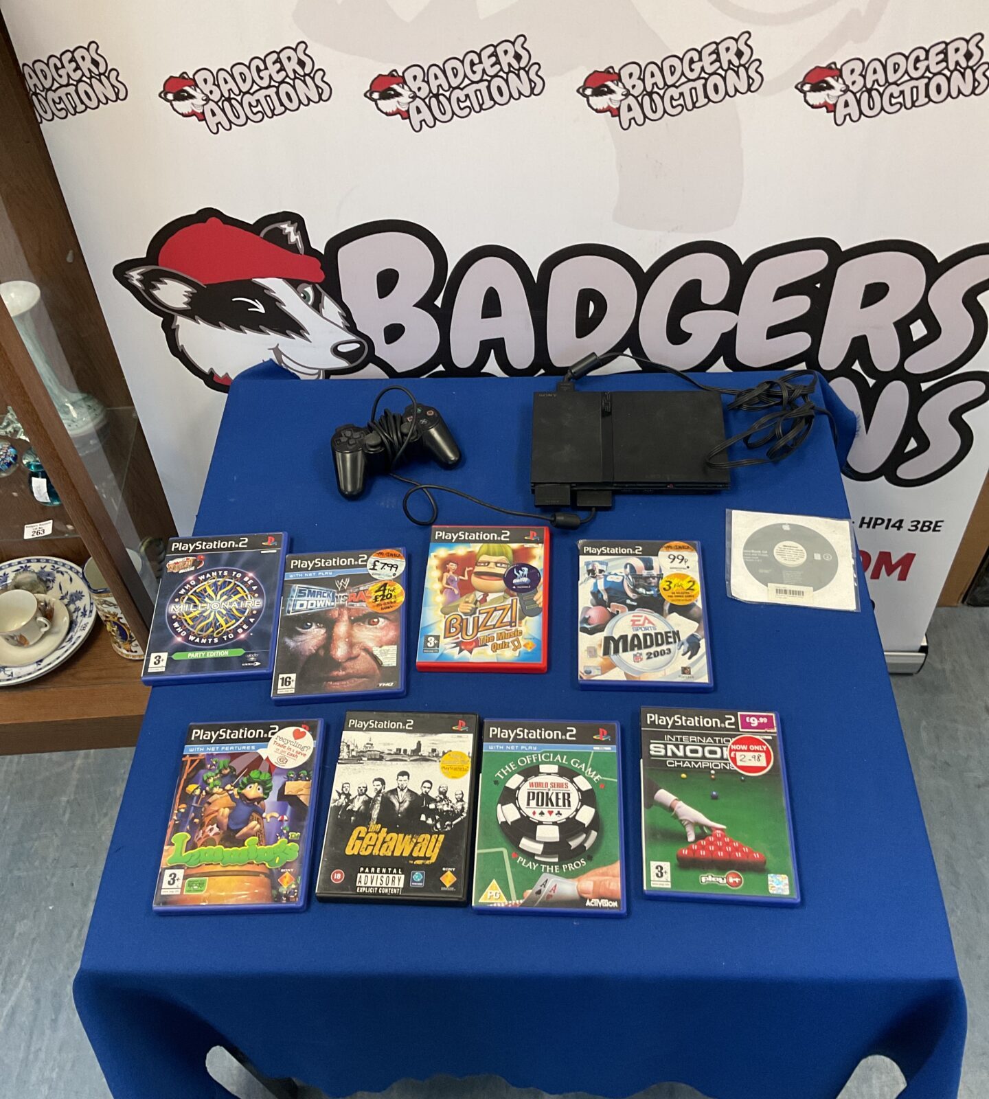 Playstation 2 console and games lot for retro gaming collectors.