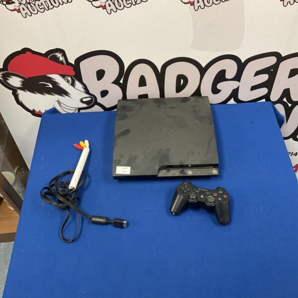 Black Playstation 3 console with remote control for gaming.