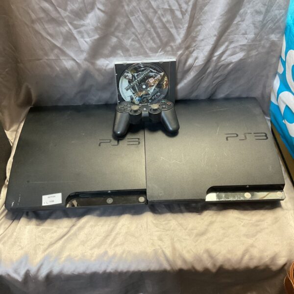 Sony Playstation 3 Slim console with controller and Ace Combat game.