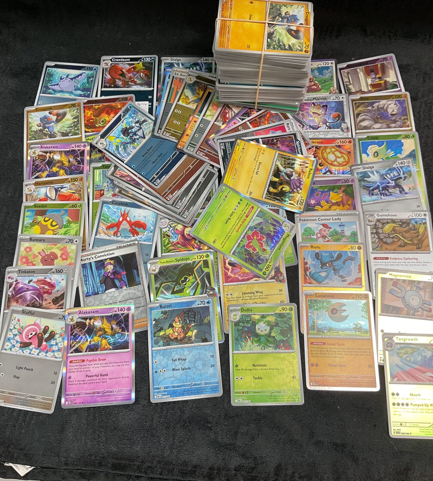 Large assortment of Pokemon trading cards for collectors.